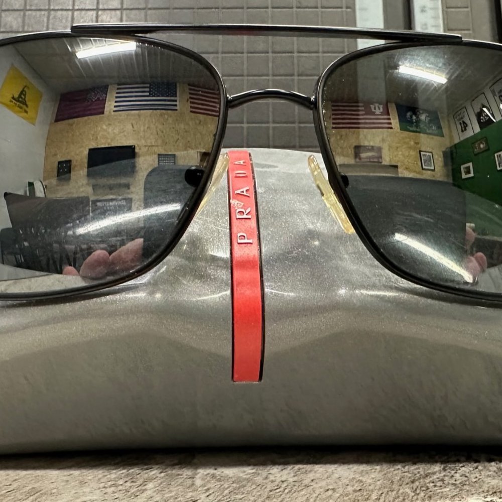 Prada Linea Rossa Sunglasses SPS 50O 1B0-7W1 Black / Silver Mirror Lens